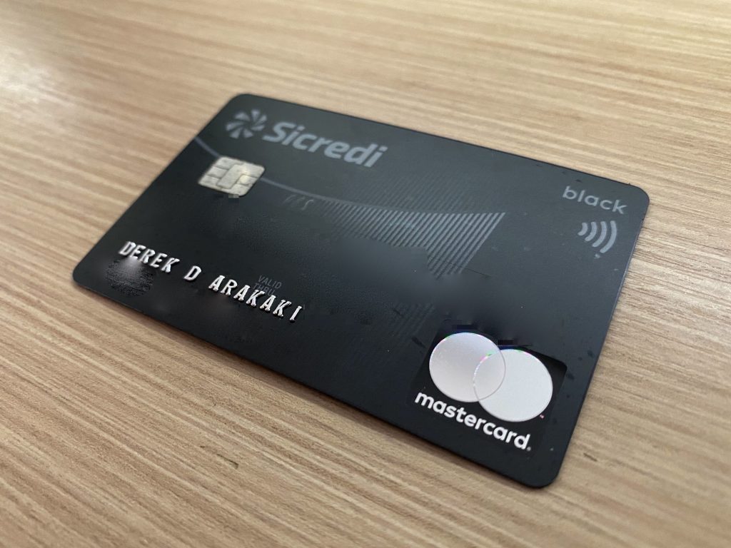 Descubra como solicitar o seu Cartão de crédito Sicredi Mastercard Black! 1 passageirodeprimeira.com kit de boas vindas do cartao de credito sicredi mastercard black img 9871 1